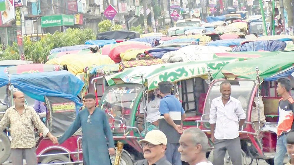 Rangpur consumers block road demanding removal of prepaid metres