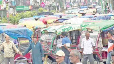 Rangpur consumers block road demanding removal of prepaid metres
