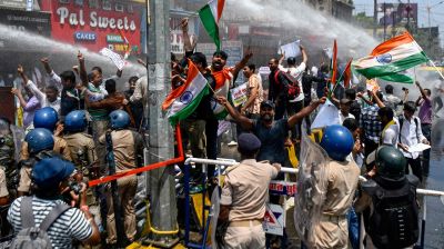 India police clash with protestors over jobs and exam transparency