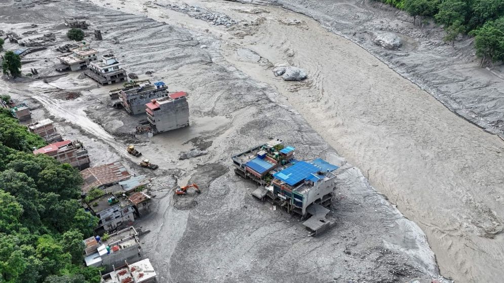 China warns of high flood risk from lake formed by mudslide