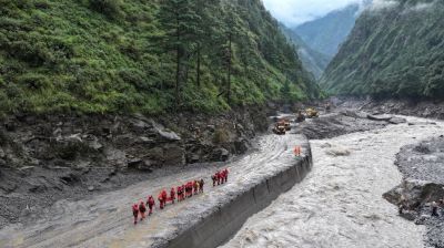 Nepal, China resume flood rescue after lake threat eases, death toll reaches 547