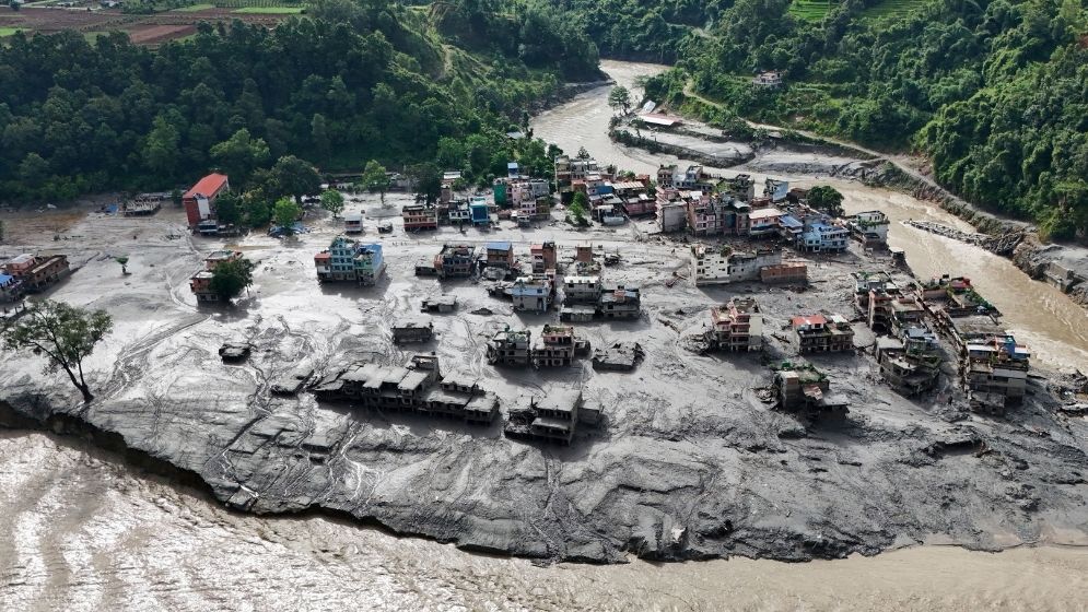Rescuers battle floods and debris as Himalayan disaster death toll nears 800