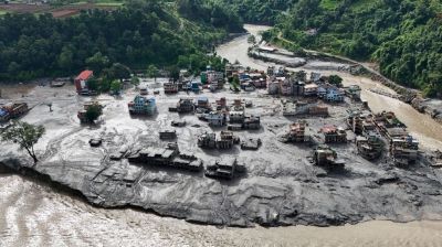 Rescuers battle floods and debris as Himalayan disaster death toll nears 800