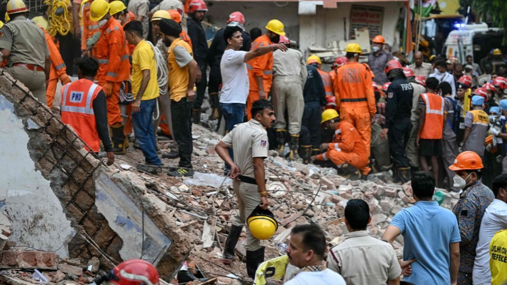 Three killed, others trapped in India building collapse