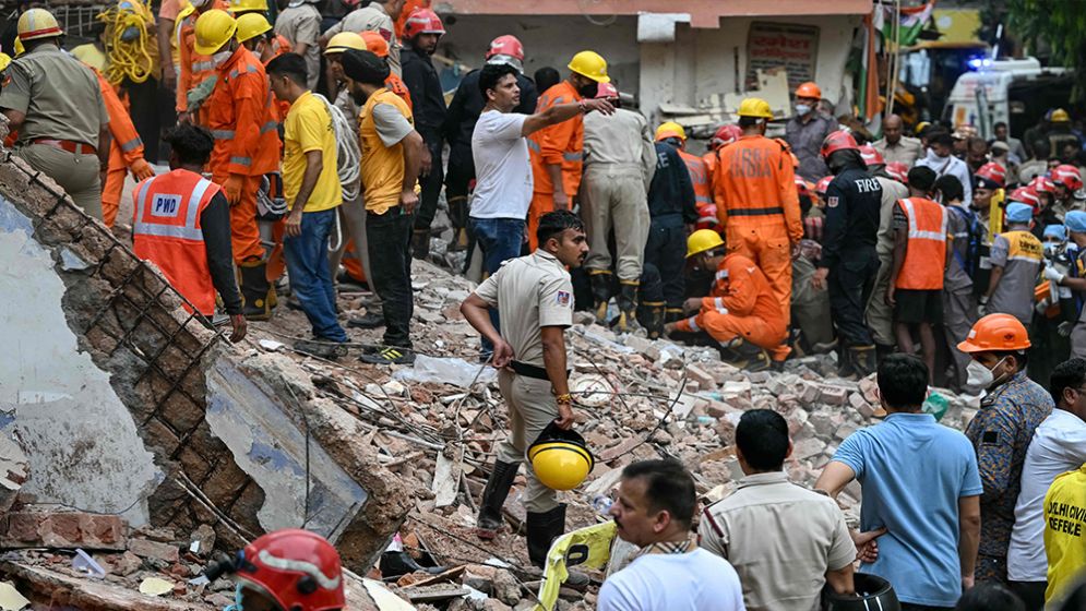India teams search for trapped after deadly Delhi building collapse