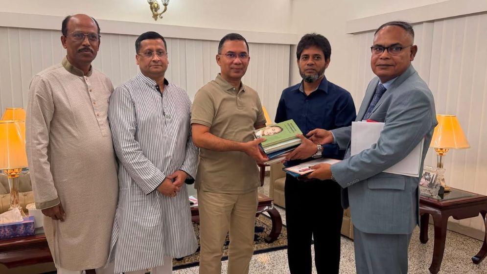 IU VC meets PM, gifts authored books