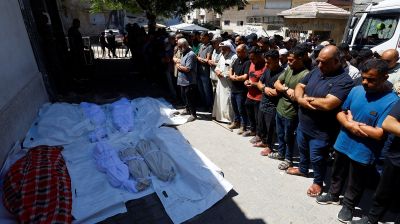 War-damaged Gaza building collapses, killing 20 and trapping dozens