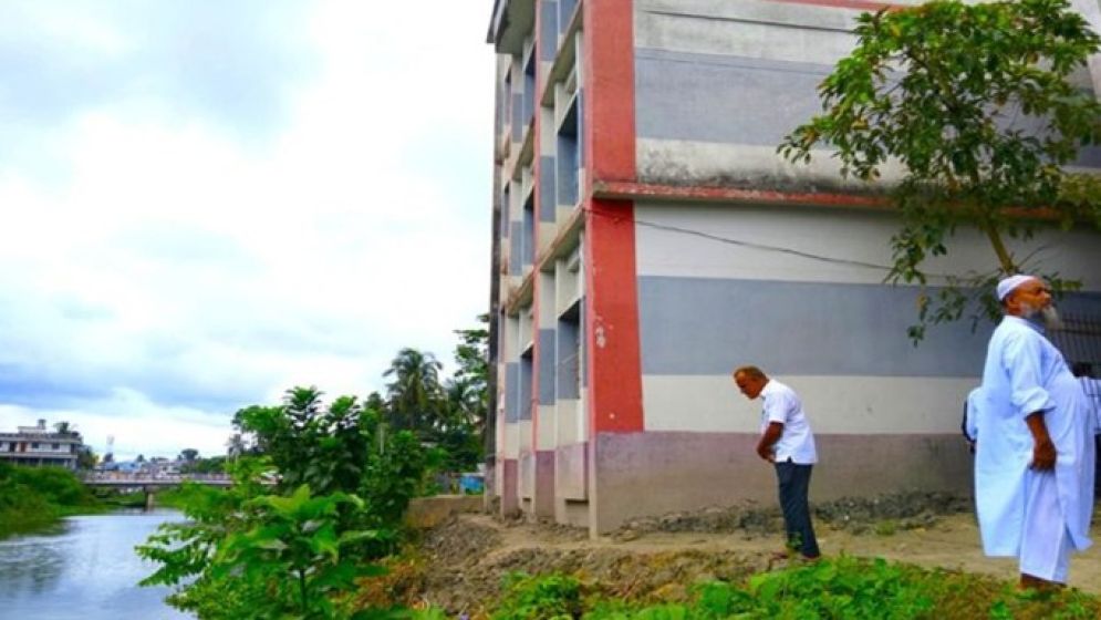Three-storey madrasa building tilts after riverbank collapse in Jashore