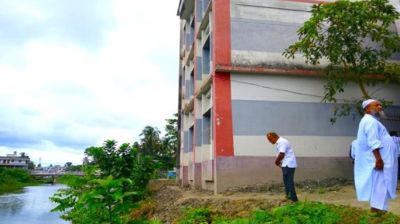 Three-storey madrasa building tilts after riverbank collapse in Jashore