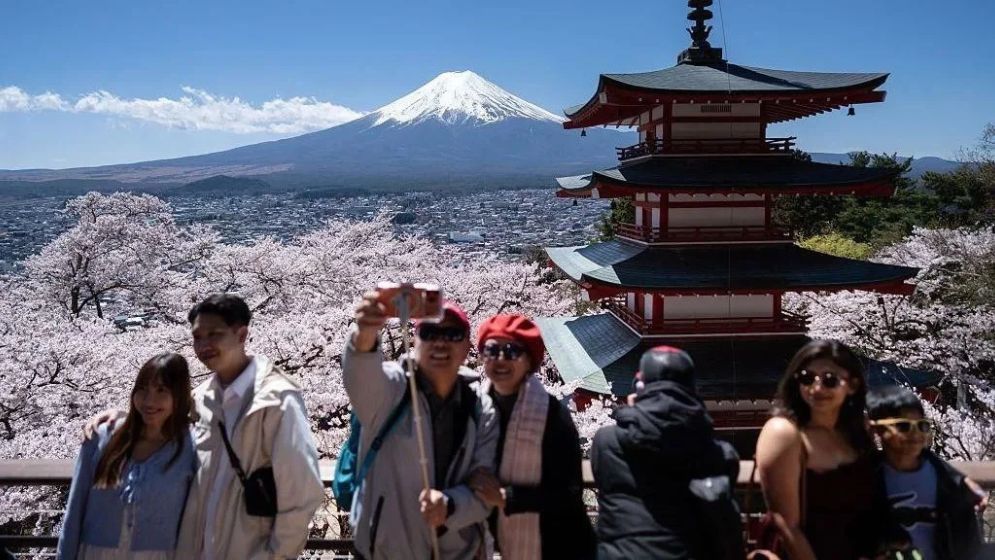 Japan toughens permanent residency rules for foreigners