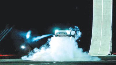Elon Musk unveils Tesla’s ‘flying’ car