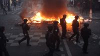 French police clash with protesters as tens of thousands rally over cost of living