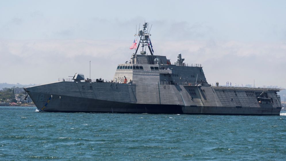 China sends naval forces to monitor US warship near disputed shoal
