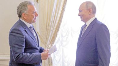 Putin agrees to resume trilateral talks on Ukraine