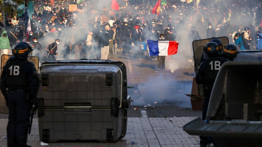 Sporadic violence flares as hundreds of thousands protest in France