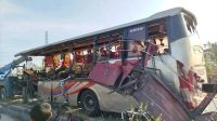 Death toll rises to four as bus crashes into parked dump truck